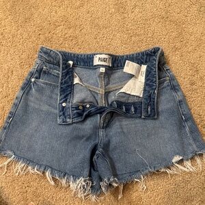 PAIGE Women's Frayed Hem Blue Jean Shorts - Noella Short. Size 26